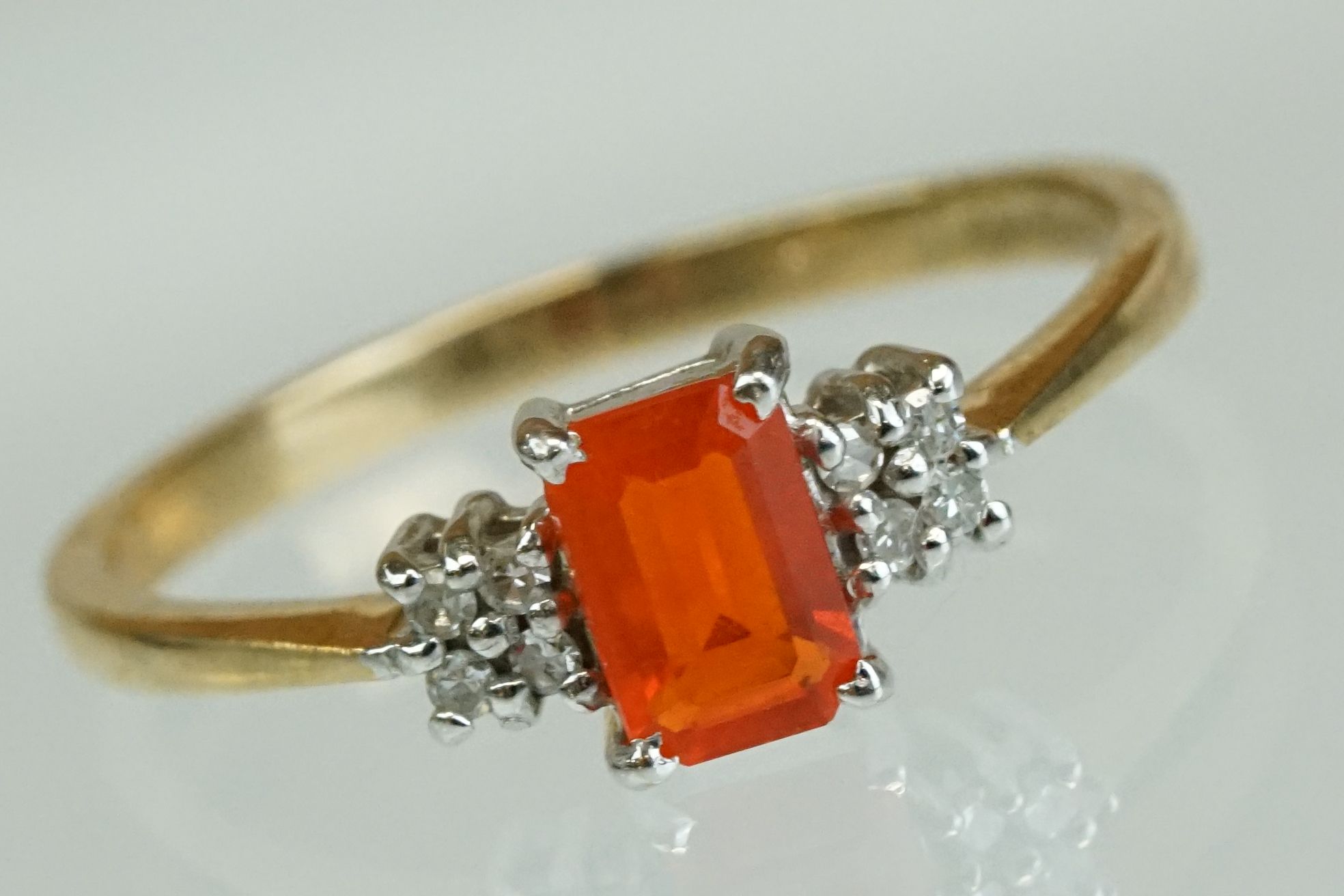 Fire opal and diamond 9ct yellow gold ring, the rectangular mixed cut fire opal measuring approx 6mm - Image 10 of 17