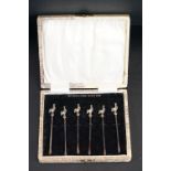 Cased set of six silver cocktail sticks with gilt cockerel finials, marked 'Sterling Silver', 7.