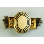 19th century enamelled yellow metal locket clasp, black enamel Greek key decoration, the oval