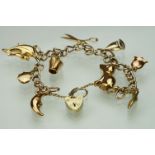 Silver gilt curb link bracelet, each link hallmarked, 9ct yellow gold padlock clasp and nine 9ct