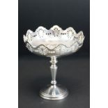 George V silver tazza with pierced border decoration, moulded rim, knopped stem, and raised on a