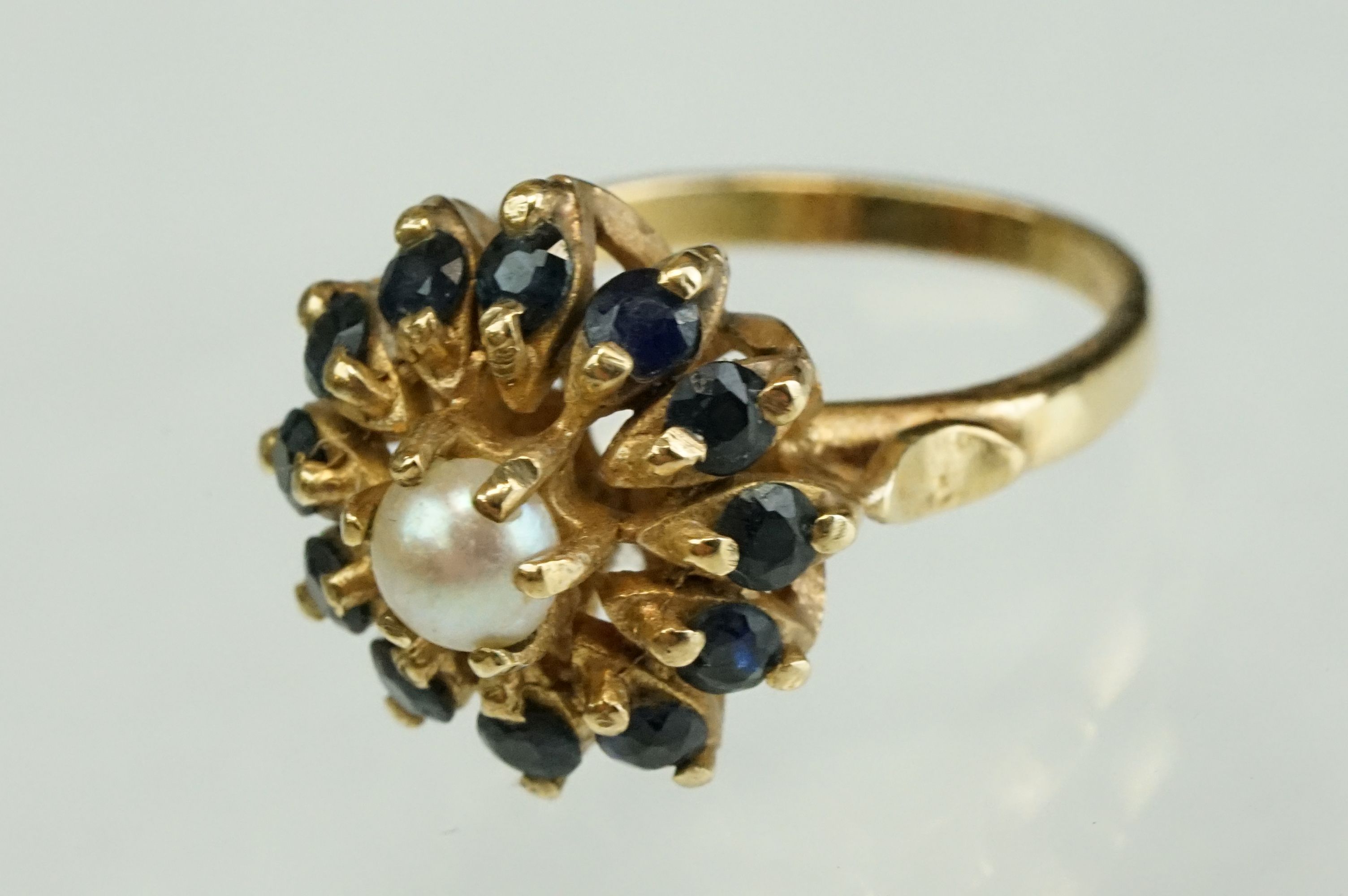 Pearl and sapphire 9ct yellow gold flower head cluster ring, the white cultured pearl to centre with - Image 3 of 9