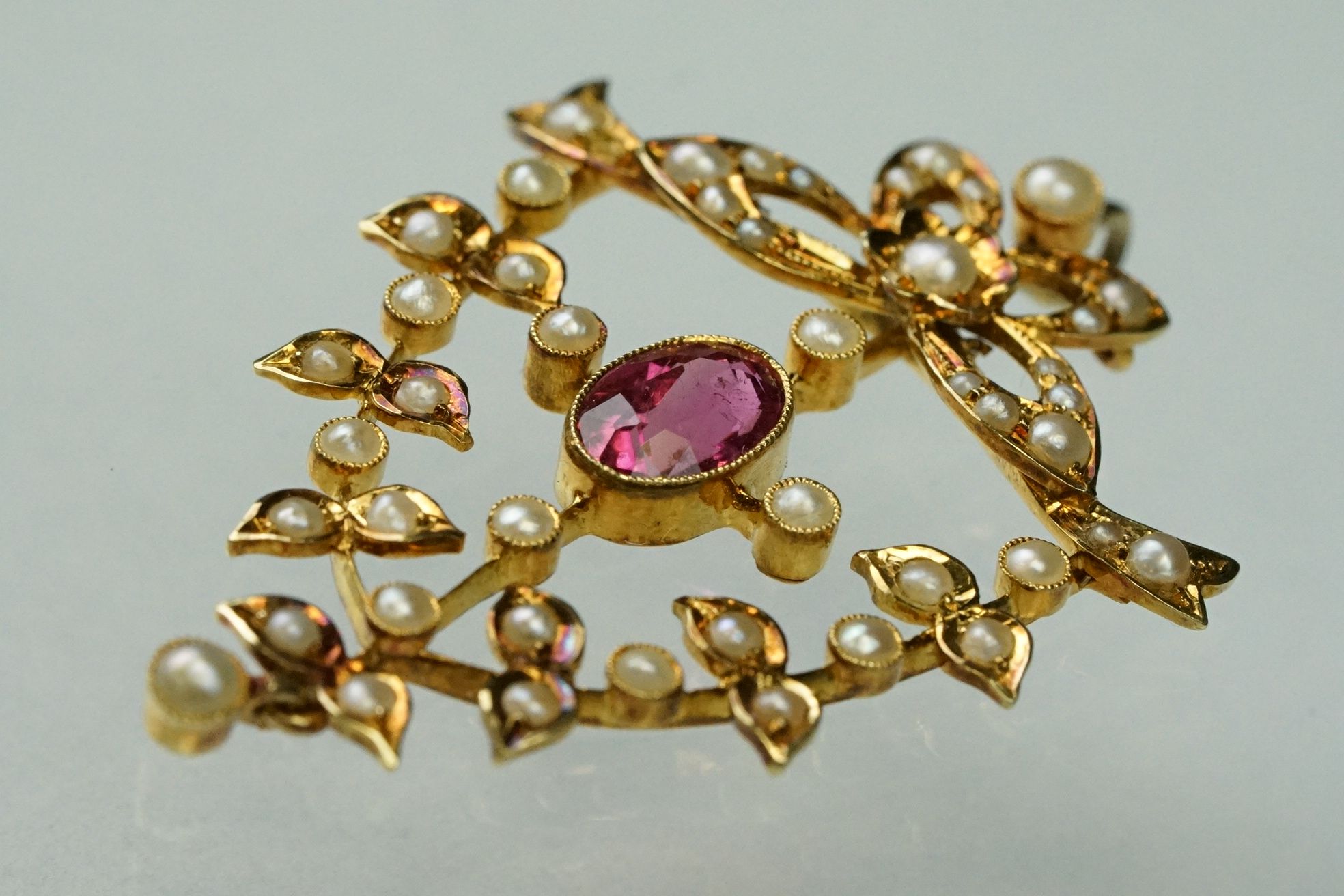 Edwardian tourmaline and seed pearl unmarked yellow gold pendant, the oval mixed cut pink tourmaline - Image 4 of 6