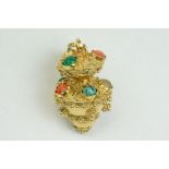 Indian gemstone set yellow metal pendant, to include coral, turquoise and chrysoprase small round