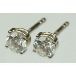 Pair of diamond 18ct white gold stud earrings, the round brilliant cut diamonds each weighing approx