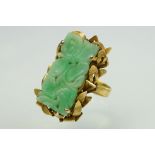 Jade 14ct yellow gold ring, carved rectangular jade panel, the jade measuring approx 26mm x 12mm,