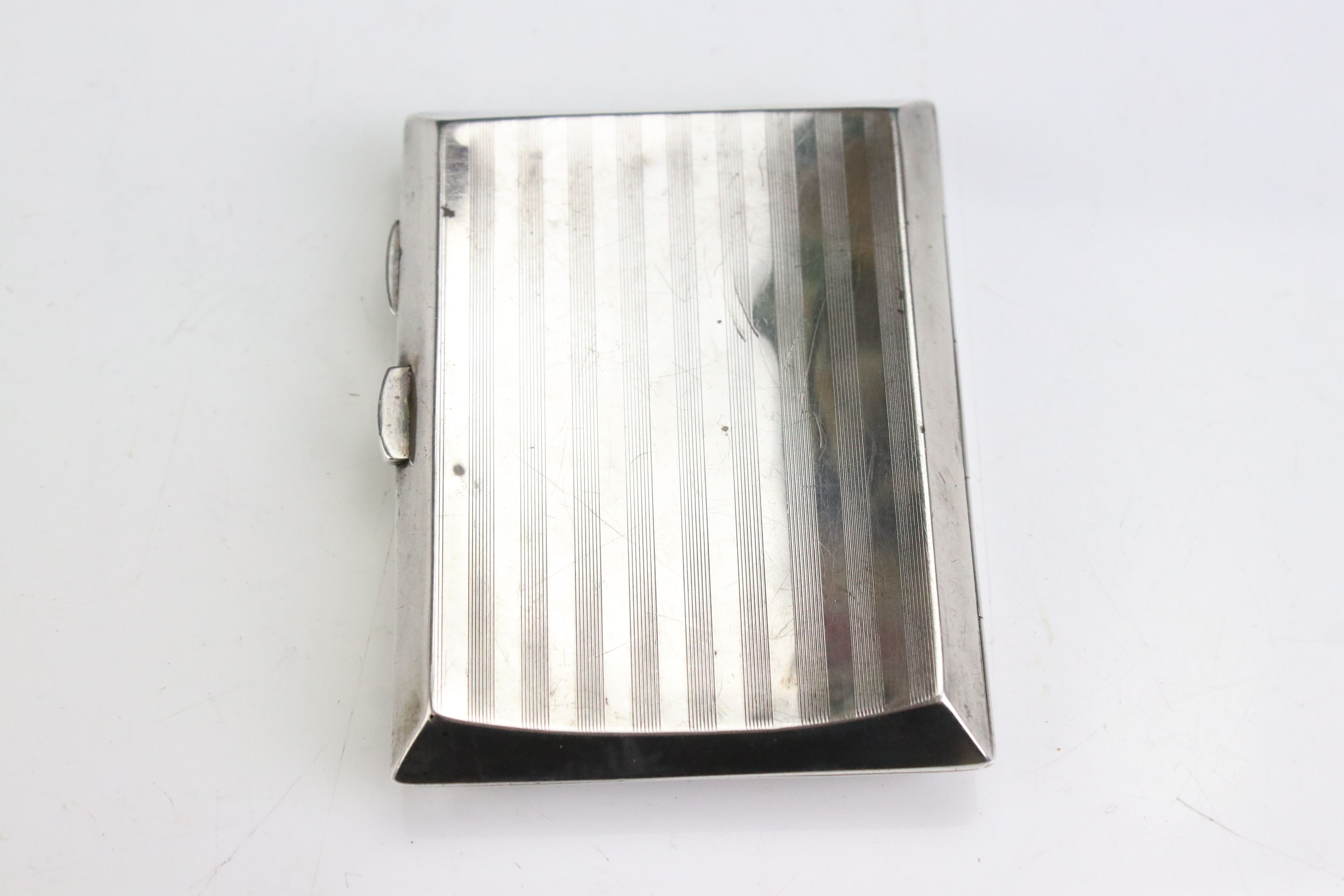 George V silver cigarette case of curved rectangular form, with engine turned striped decoration, - Image 3 of 5