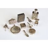 Collection of small silver items to include a 20th century novelty pill box modelled as luggage, 2.