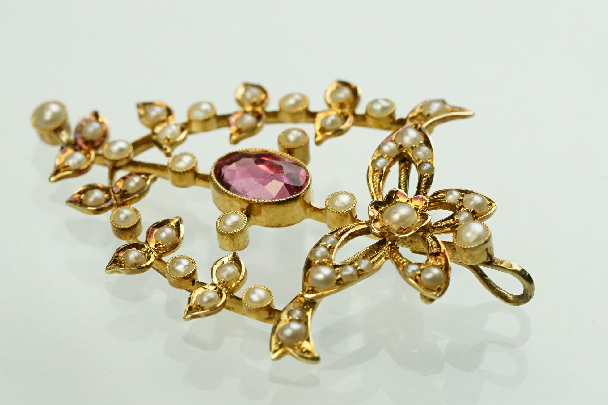 Edwardian tourmaline and seed pearl unmarked yellow gold pendant, the oval mixed cut pink tourmaline - Image 3 of 6