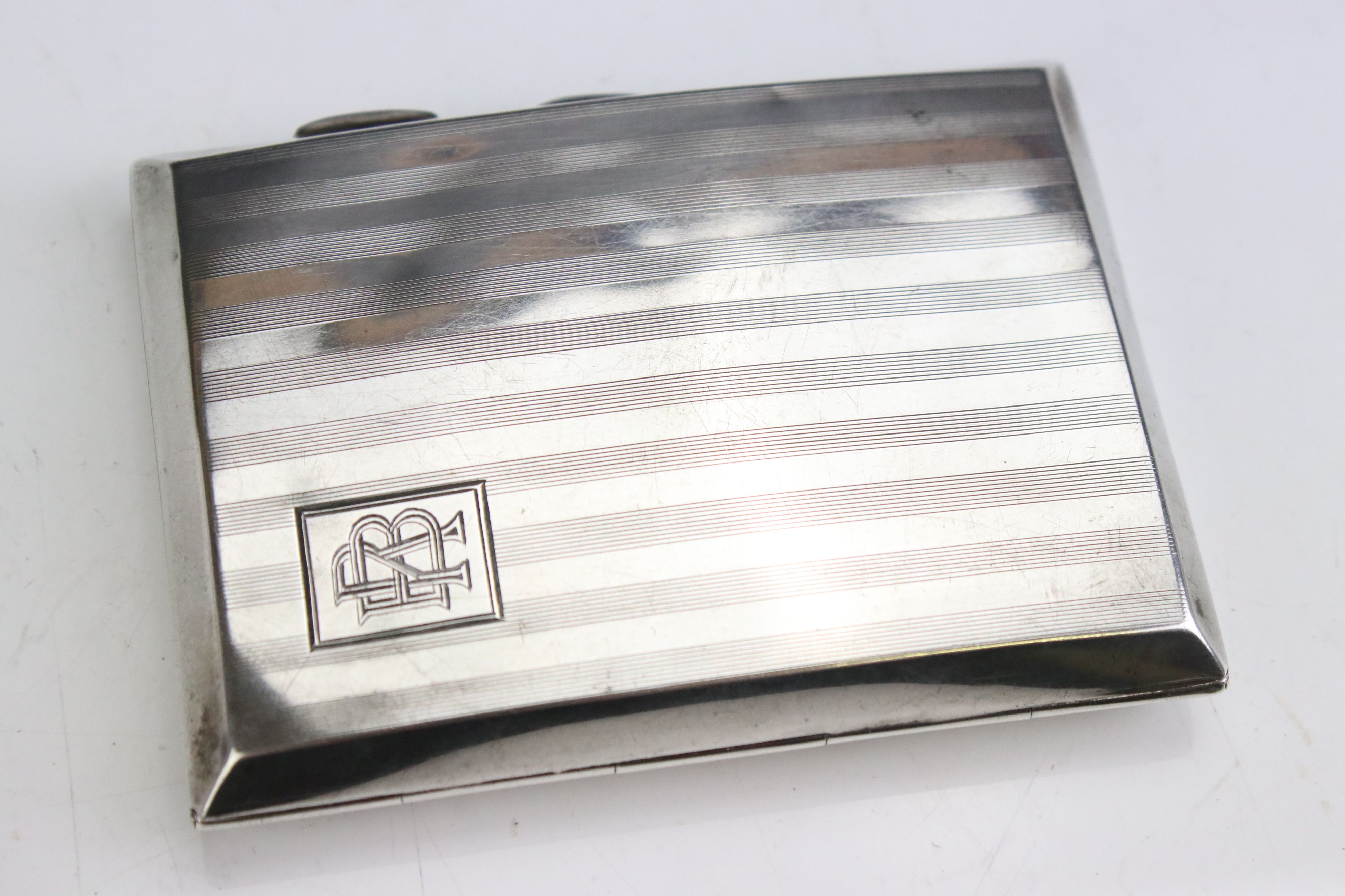 George V silver cigarette case of curved rectangular form, with engine turned striped decoration, - Image 2 of 5