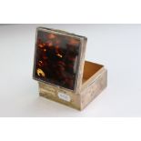 Tortoiseshell and silver cigarette box of square form, with tortoiseshell hinged lid, plain polished