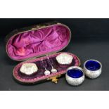 Late Victorian Walker & Hall pair of silver salts and spoons, the salts with crimped borders and