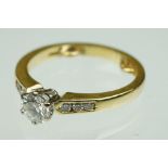 Diamond solitaire 18ct yellow gold ring, the round brilliant cut diamond weighing approx 0.40 carat,