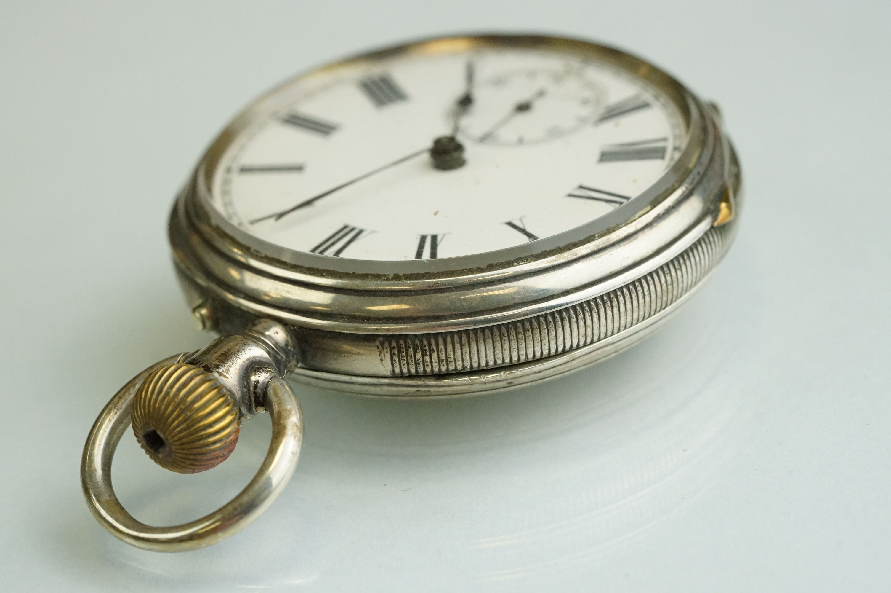 Silver open faced crown-wind pocket watch with black Roman numerals on a white enamel dial, - Image 5 of 8