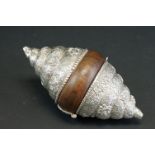 Arabian white metal and hardwood container, shell-like terminals, repoussé fish and foliate