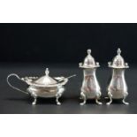 Elizabeth II silver three piece cruet set, comprising a lidded mustard with blue glass liner,