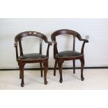 Pair of Victorian Mahogany Horseshoe shaped open Tub Chairs with padded black leather studded seats,