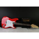 Rocket Music Electric Red Guitar together with Rocket Music GA10 Amplifier and a Stand