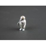 Silver figure of a penguin