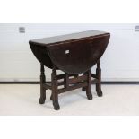 Early 20th century Circular Oak Gate-leg Table, raised on turned and block supports, 91cm long x