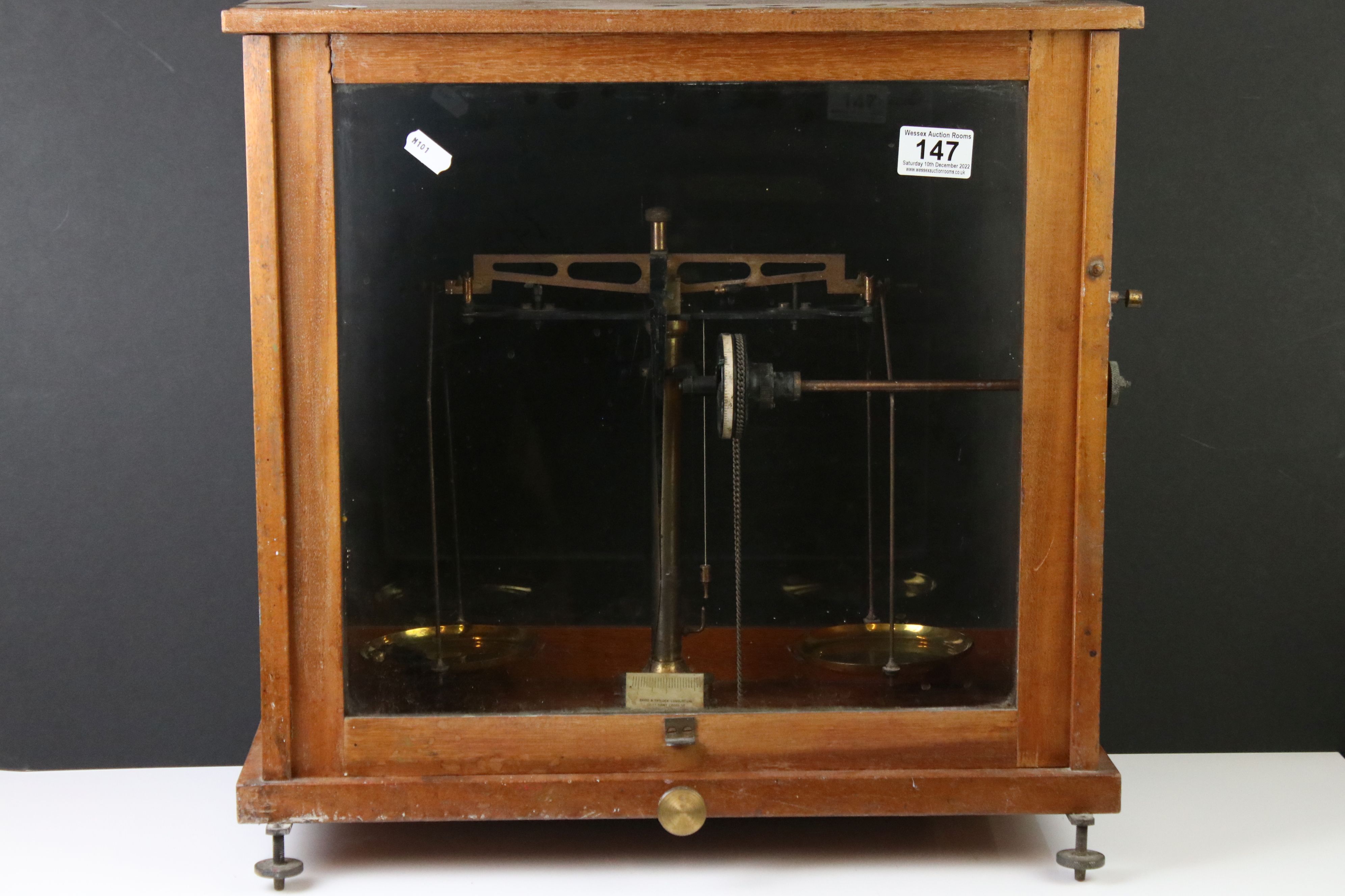 Baird & Tatlock, London set of vintage balance weighing scales housed within a wooden case, with