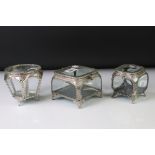 Three glass and metal jewellery caskets