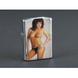 1970's / 80's Flick Lighter decorated with a Topless Model