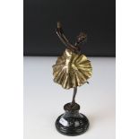 Bronze figure of a dancing ballerina, mounted on a polished stone pedestal, signed 'Efte', 25cm high