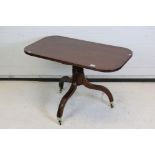 19th century Mahogany Rectangular Low Table raised on a turned column and three splay legs with