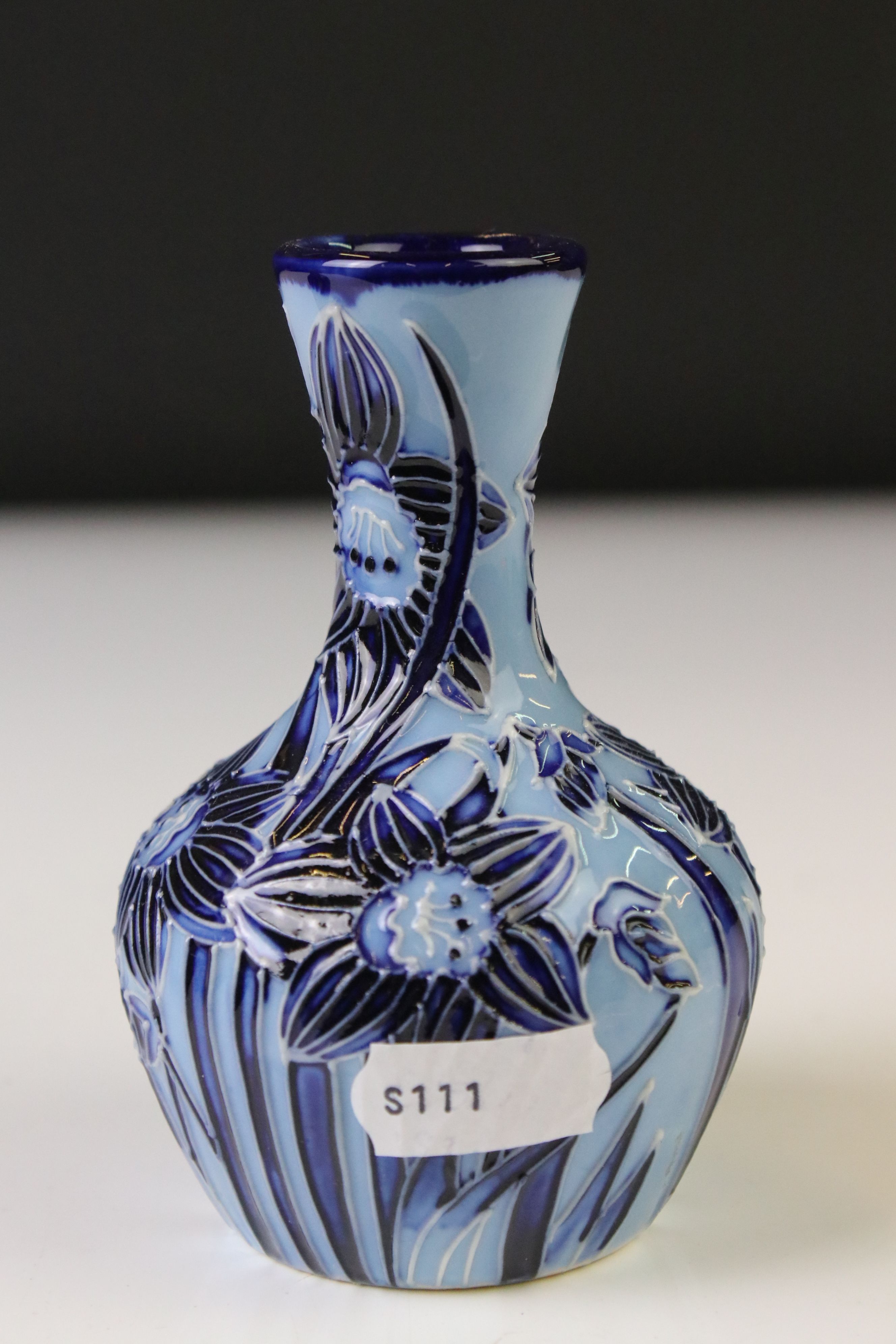 Two Moorcroft pottery vases of bulbous form to include a Violets pattern example on blue ground, - Image 5 of 8