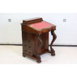 Victorian Figured Walnut Davenport, the hinged top opening to a stationery rack, the hinged red