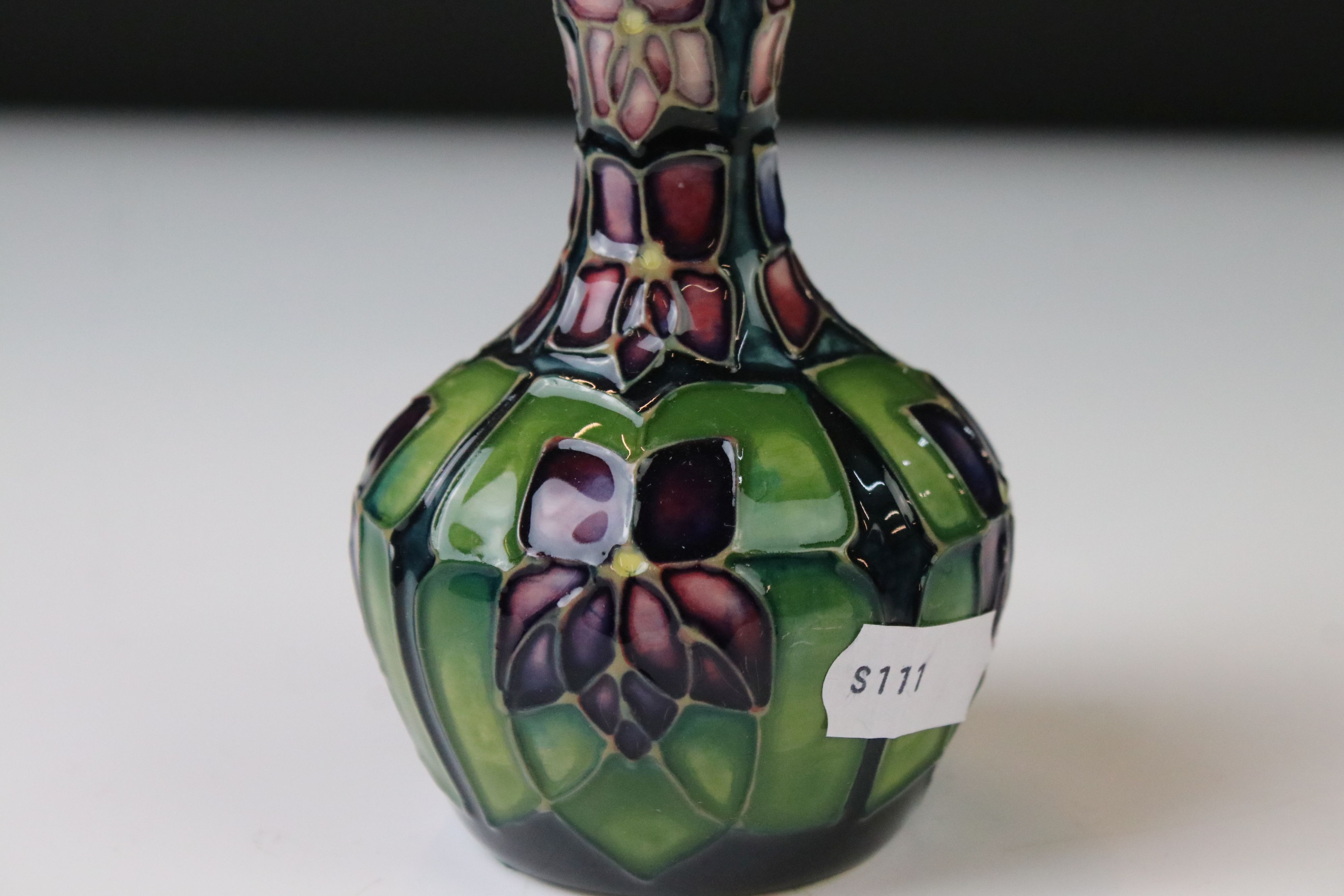 Two Moorcroft pottery vases of bulbous form to include a Violets pattern example on blue ground, - Image 3 of 8