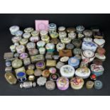 A large collection of pill / trinket boxes to include sterling silver and Halcyon Days examples plus
