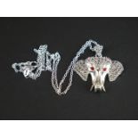 Silver and marcasite pendant necklace in the form of an elephant with ruby eyes