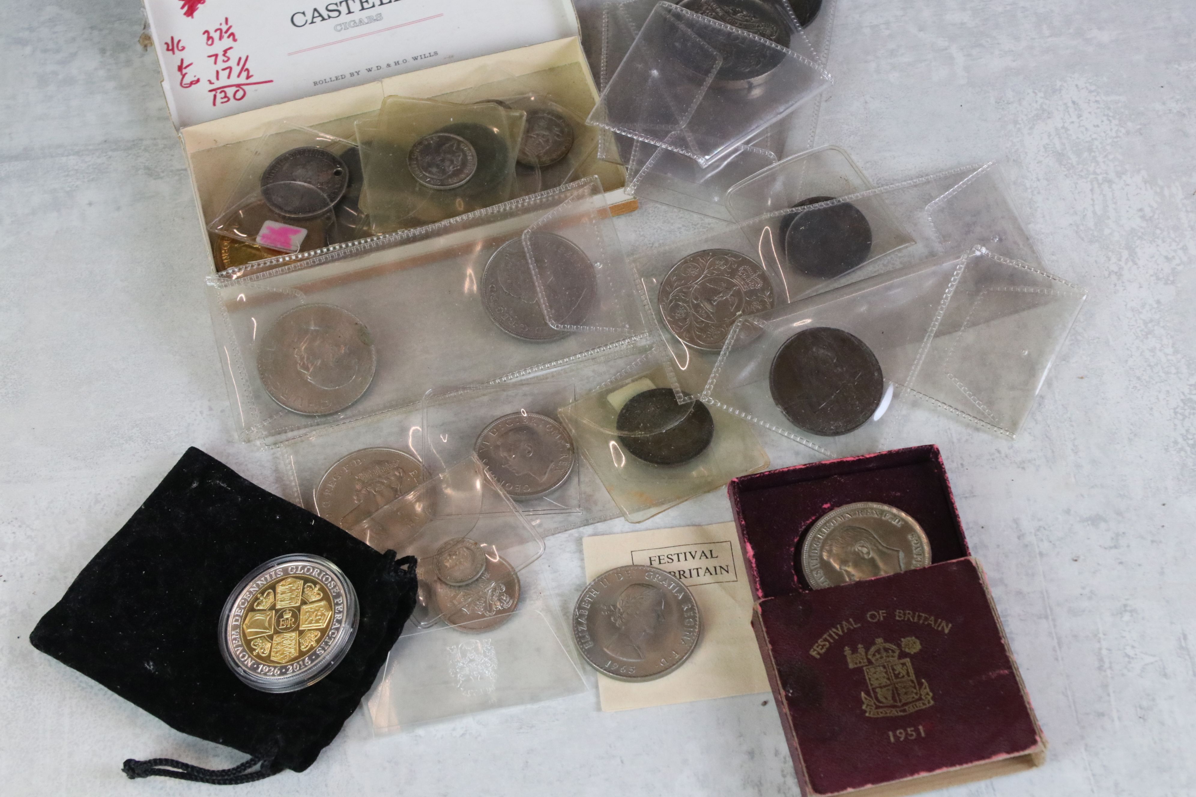 A collection of mainly British pre decimal coins to include silver examples.