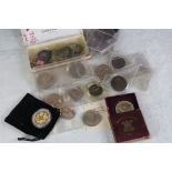 A collection of mainly British pre decimal coins to include silver examples.