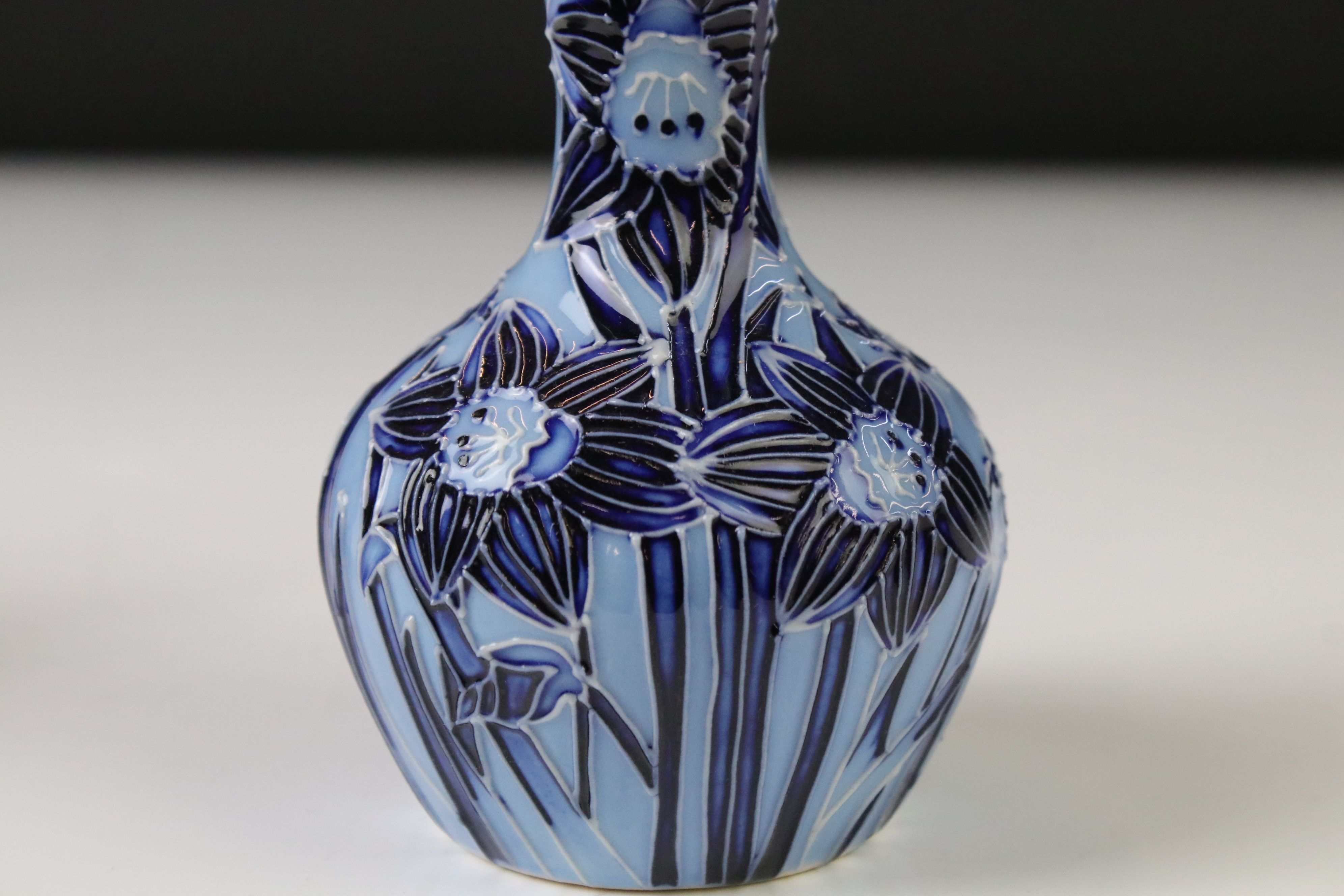 Two Moorcroft pottery vases of bulbous form to include a Violets pattern example on blue ground, - Image 6 of 8