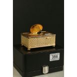 A contemporary gilt metal singing bird automaton music box.