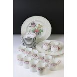 Richard Ginori of Italy set of 12 coffee cans and 13 saucers, with floral garland decoration, plus a