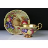 Aynsley Orchard Gold tea cup and saucer, the teacup with gilt interior and foot rim, the saucer with