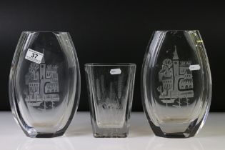Pair of Norwegian Hadeland glass vases decorated with etched village motifs, of ovoid form,