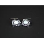 Pair of silver cufflinks with opal panels