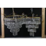 Two Gilt Metal Glass Crystal Drop Four Tier Waterfall Chandeliers, largest 41cm diameter x 40cm high