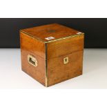 Edwardian brass bound oak decanter box, the hinged lid opening to reveal 4 fitted compartments,