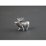 Silver figure of a rutting stag