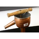 Royal Naval Rum / Spirit Pump, copper with wooden pump handle and brass perforated foot, 105cm long