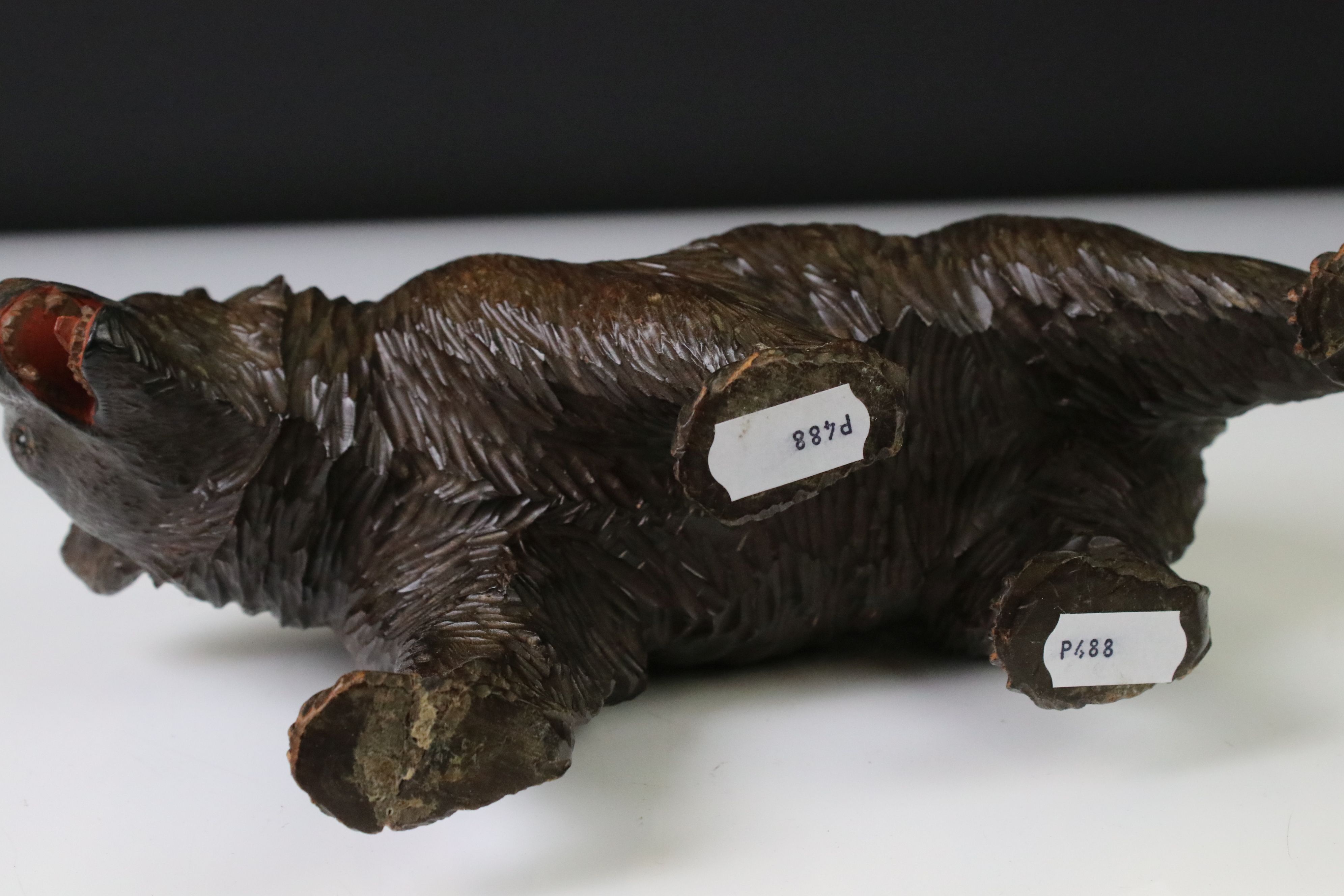 Black Forest style carved figure of a walking bear, mouth open, 25cm long (2 paws a/f) - Image 8 of 9