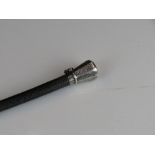 A Victorian leather riding crop with fully hallmarked sterling silver top and collar.