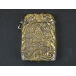 Brass vesta case with embossed Masonic style decoration