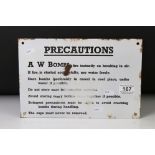 A W Bombs ' Precautions ' enamel sign advising safe munitions storage information, black lettering